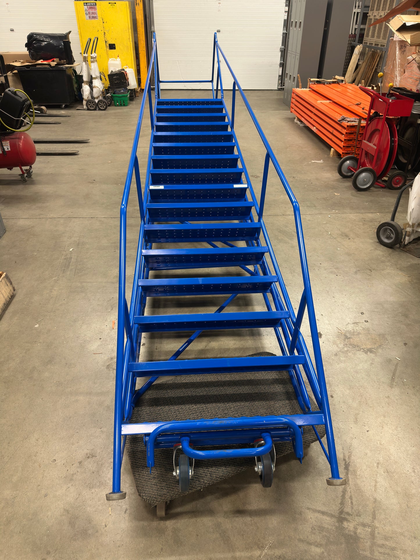 Used 16 Step Rolling Warehouse Ladder